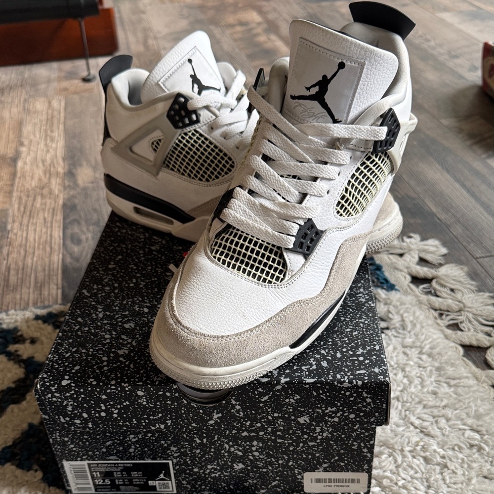 Air Jordan 4 Retro White and Black Sneakers